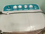 LG P7001R3F, a 6 Kg semi-automatic top-load washing machine.