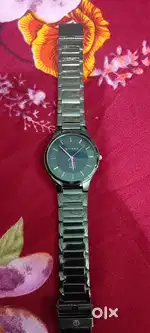 Titan Watch in glossy green