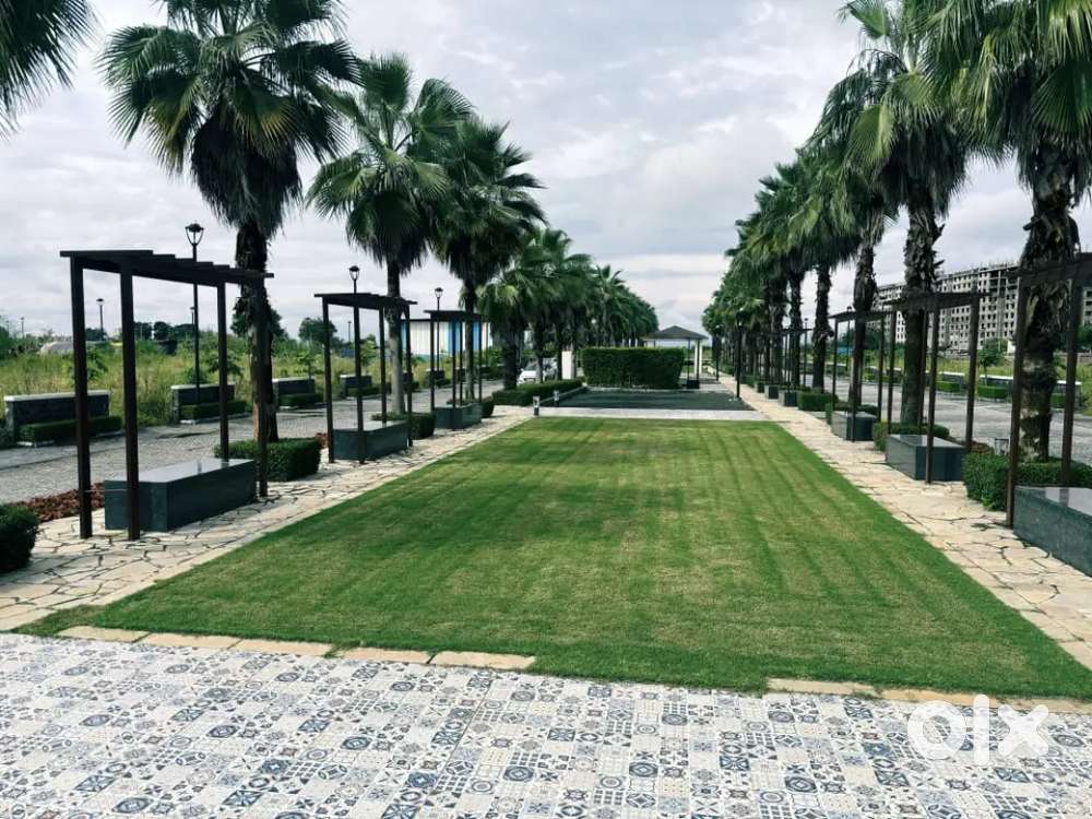 Near Airport Garden Facing Plot For Sell