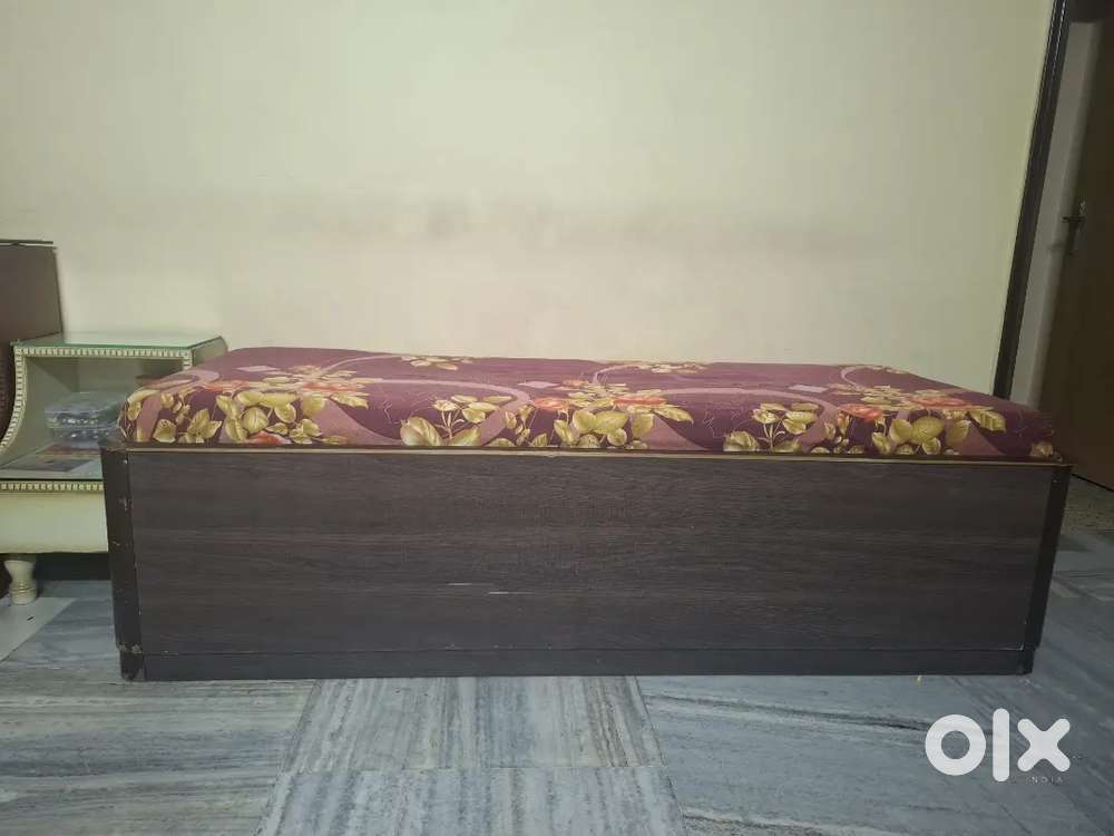 Single box bed with small wardrobe