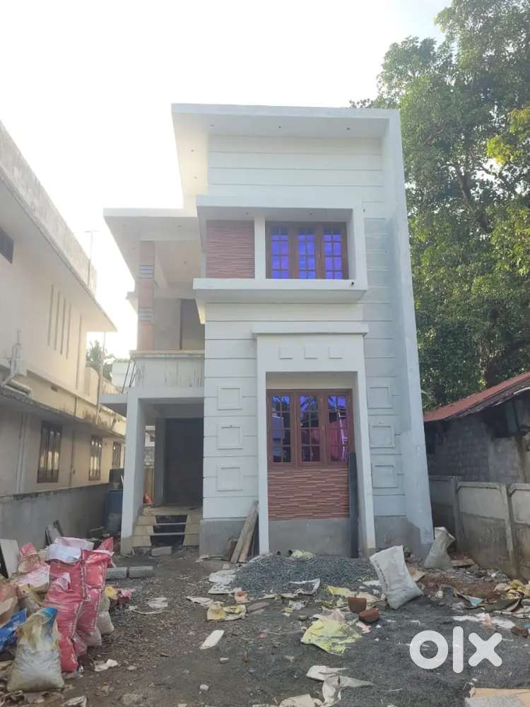 A SUPERB NEW 3BED ROOM 1500SQ FT 5.4CENT HOUSE IN NELLIKKUNNU,THRISSUR
