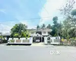 Highway front plot with 2 stored house