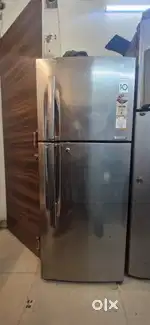 Sell my  duble door fridge  4 year warranty