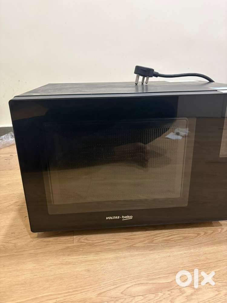 Tata Voltas beko Microwave with oven not even singleday used