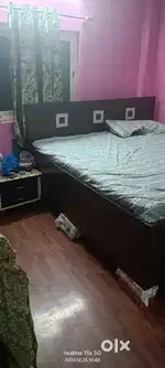Double box bed for sale with two side table