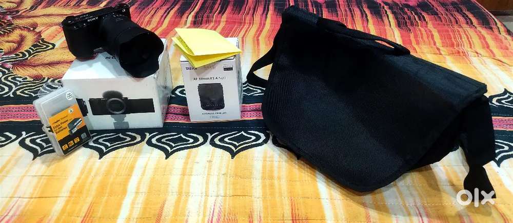 Sony zve10 with meke 33 mm f1.4 lens,beg, battery,bill