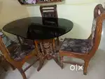 Glass dining table with 4 chairs