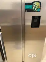 566 lts sparingly used side by side hisense fridge