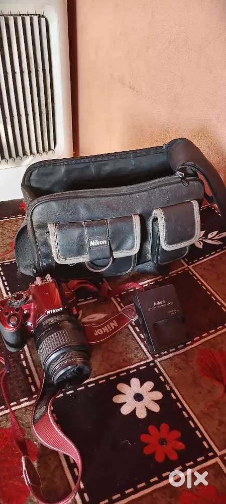 Nikon camera 3100d h charger aur bag h