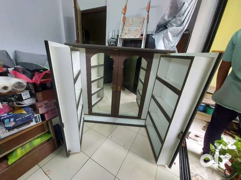 Wardrobe with mirror cabinet
