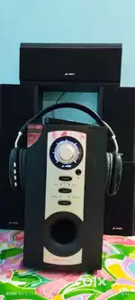 Home Theater sound system New condition.One Big speaker 5 Nos small...