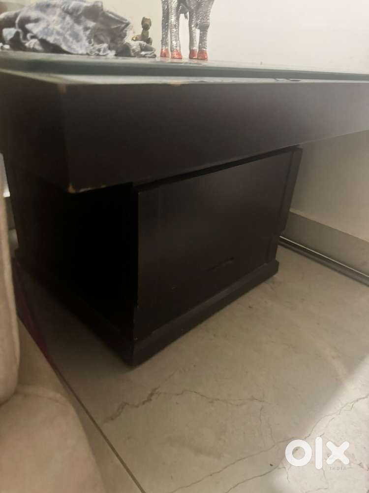 Glass top wooden table