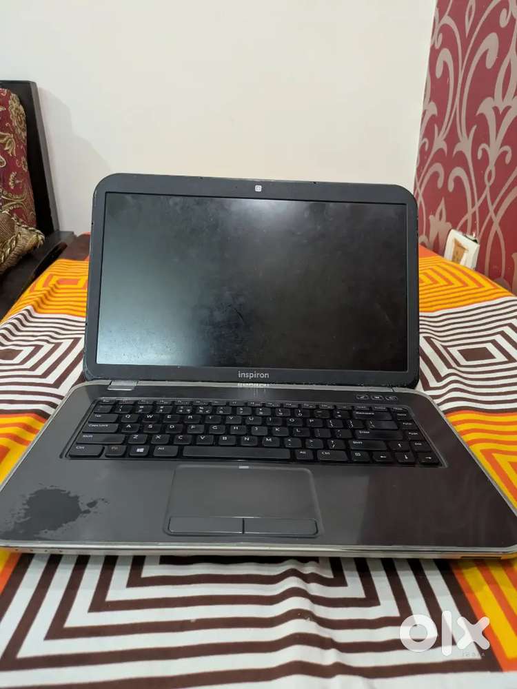Dell Inspiron 5520 laptop with charger