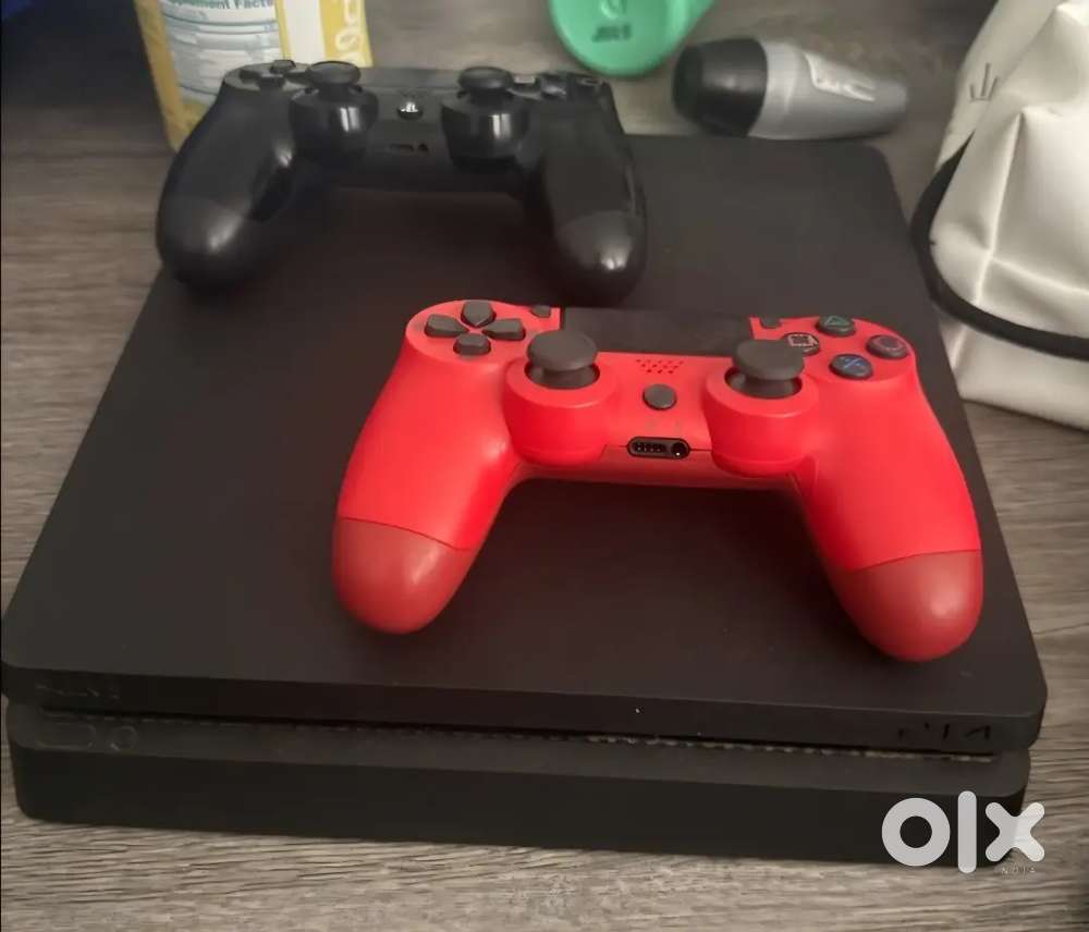 PS4 1TB Slim with 2 Dual shock 4 Controllers