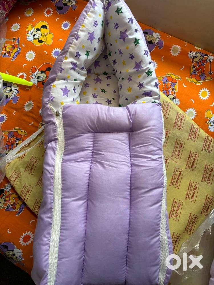Baby carrier and bed