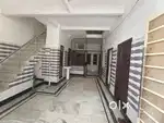 A bedroom and kitchen available for rent.