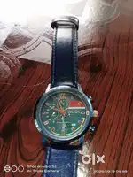 Brand new Delton men’s wrist watch in stylish blue design.