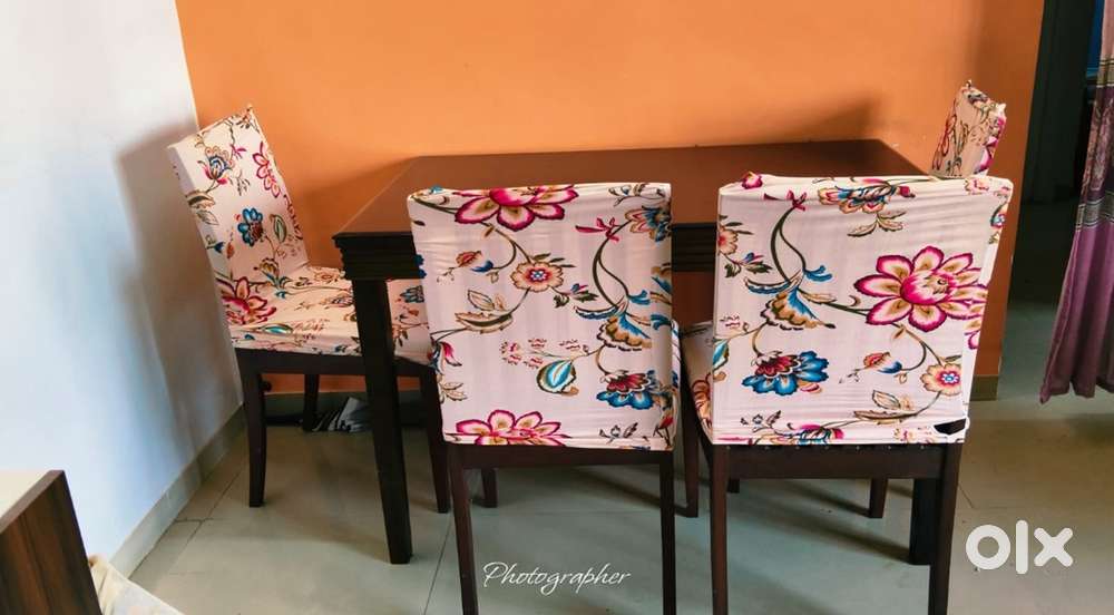 Wooden Dining table with four wooden chairs