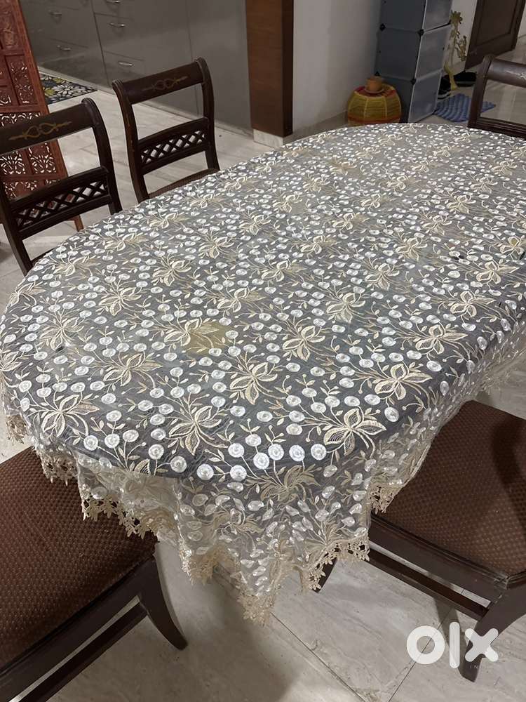 Dining table 6 seater , oval shape , teak wood