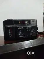 camera company name 'yashica' a 25 year old antique piece