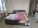 Queen size bed  n storage cabinet