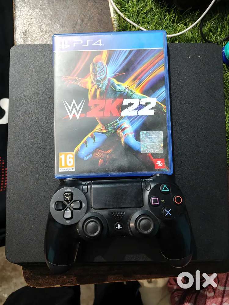 PS4 Slim 1TB + WWE 2k22 + Original Accessories Good Condition  16499