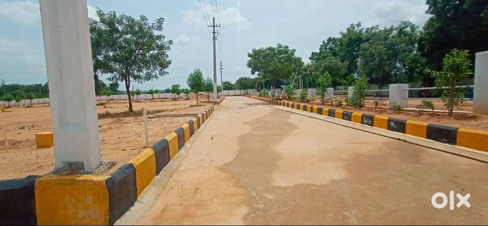 MAIN ROAD SITE 200 YDS OPEN PLOT FOR SALE IN HMDA  NEAR CHEERIYAL