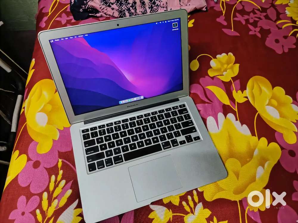 Macbook air intel i5 with charger approx 1year old