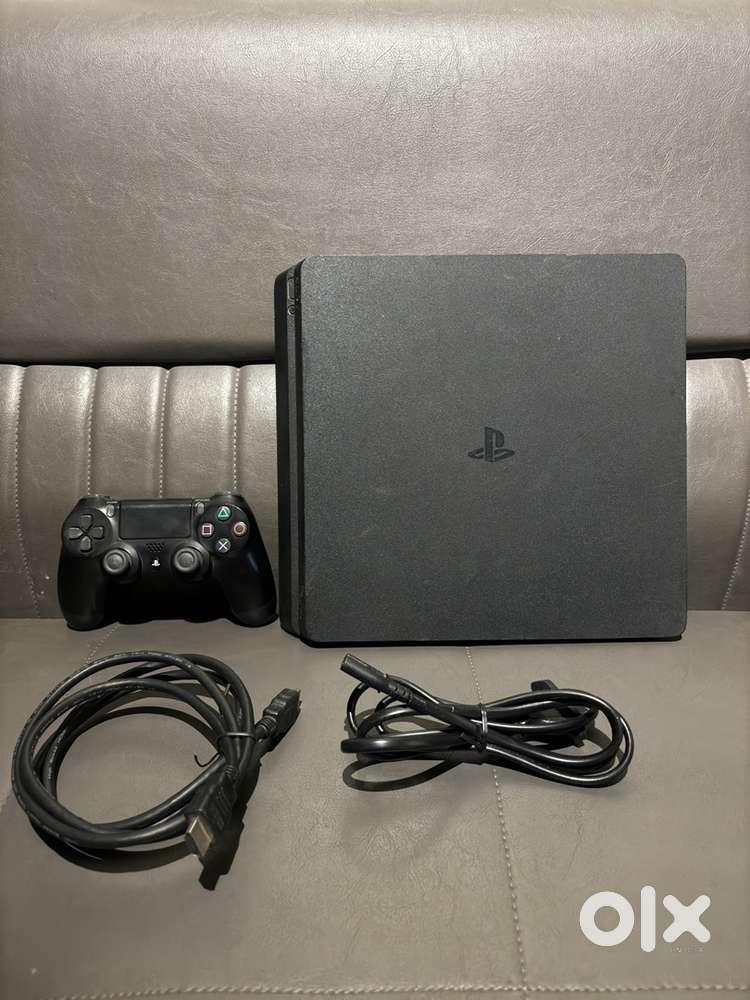 Ps4 slim 1tb with games superb condition very less used