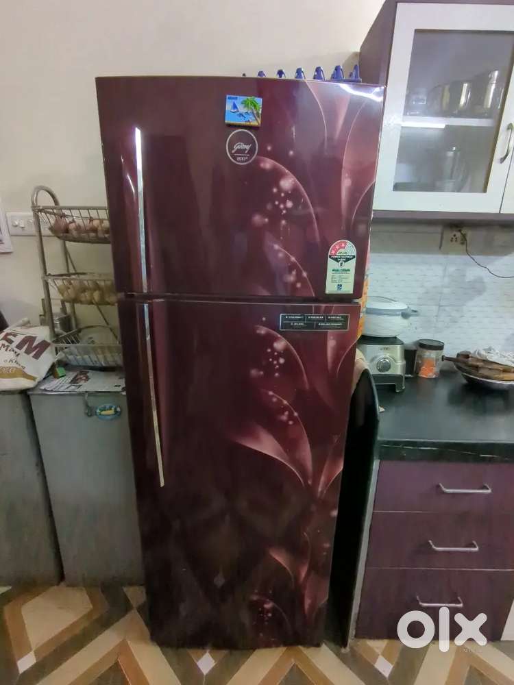 Godrej Refrigerator and Whirlpool Washing Machine