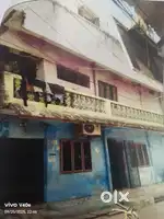 Three floors house and three shops for sale