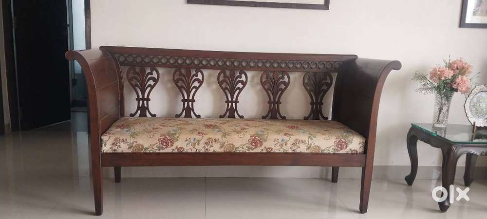 Antique double seater, antique table, compact TV unit