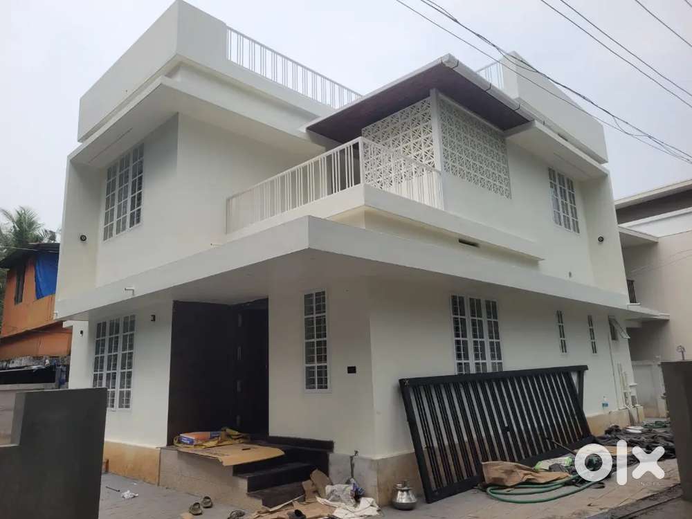 A SUPERB NEW 3BED ROOM 1390SQ FT HOUSE IN KOTTEKKAD,THRISSUR