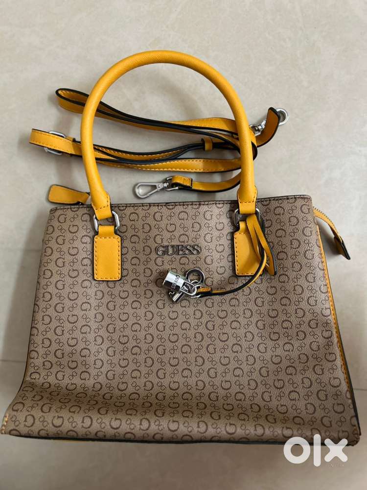 Guess signature print tote bag with zipper closure and metallic charm
