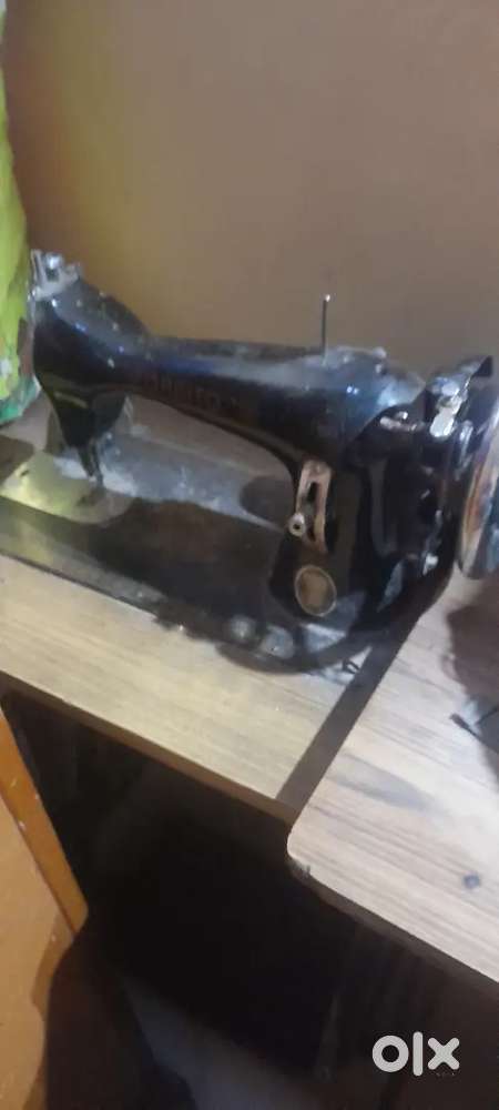 Singer And Overlock Machine Available