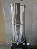 Steel sediment water filter with candle
