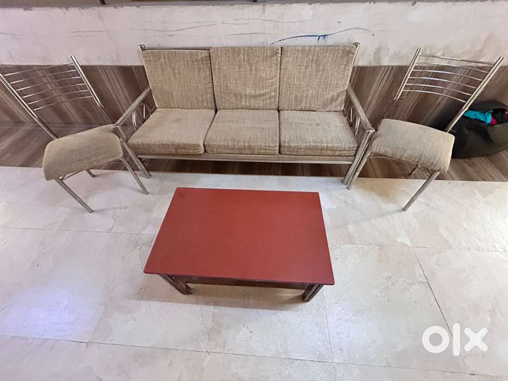 Steel pipe sofa with beautiful brown cushioning.