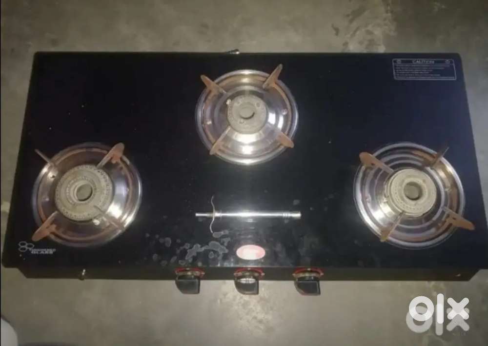 Glass gas stove with three burners