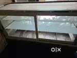 Display Table with Interlock covered from Glass Doors