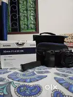 Sony a6400 with 16-50mm kit lens and 30mm 1.4 including bag