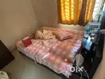 Bed, table, book shelf, chair, small table