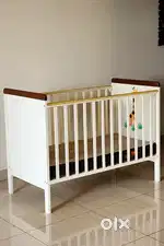 Baby crib with mattress