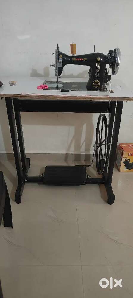 2 months old sewing machine with motar