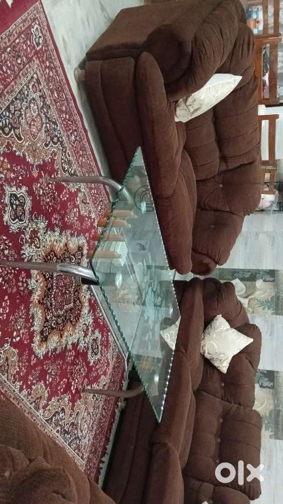 7 seater sofa with designer glass table
