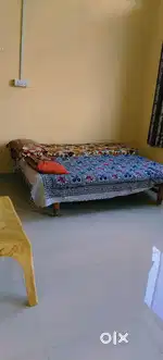One Room attech toilet bathroom with beds And cupboard and collar