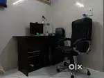 Computer with table and chair