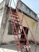 An iron ladder coated with red oxide