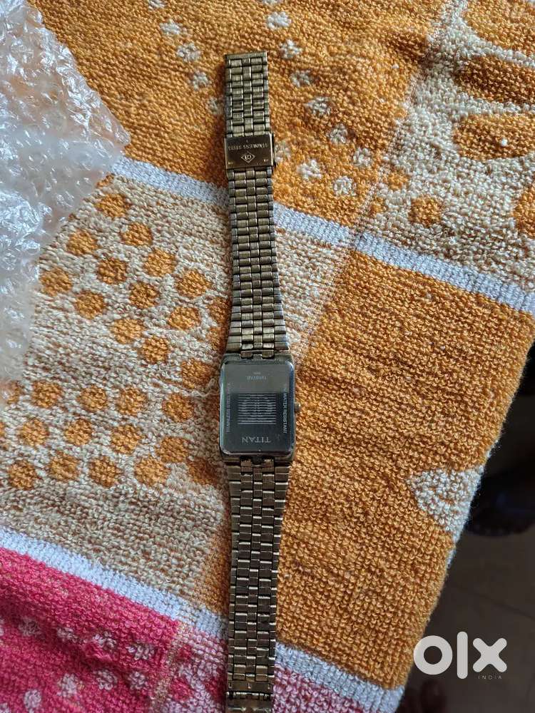 Titan Gold Analog Wristwatch - Elegant & Classic Design