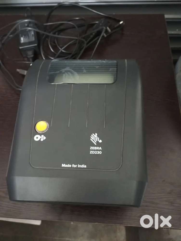 Zebra zd230 printer and 10 rolls