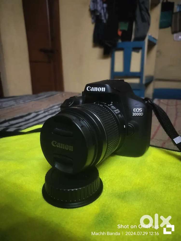 Canon EOS D3000 with 18-55  new condition with original box and bill